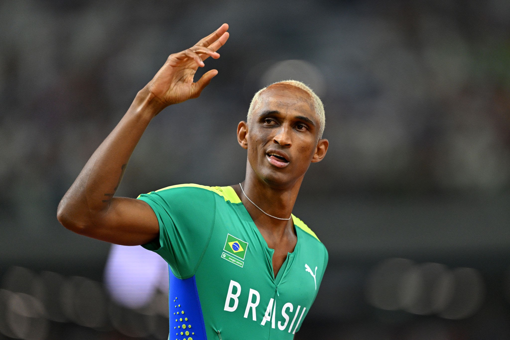 BUDAPEST, HUNGARY - AUGUST 23: Alison Dos Santos of Team Brazil looks on ahead of competing in the Men's 400m Hurdles Final during day five of the World Athletics Championships Budapest 2023 at National Athletics Centre on August 23, 2023 in Budapest, Hungary. (Photo by David Ramos/Getty Images)