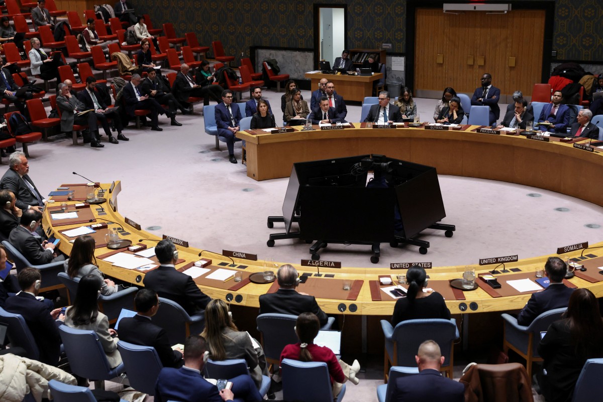 Venezuela's ambassador to the UN Samuel Moncada (C, R) speaks during a United Nations Security Council meeting on U.S. Military Actions against Venezuela, at United Nations headquarters on December 23, 2025 in New York. (Photo by ANGELA WEISS / AFP)