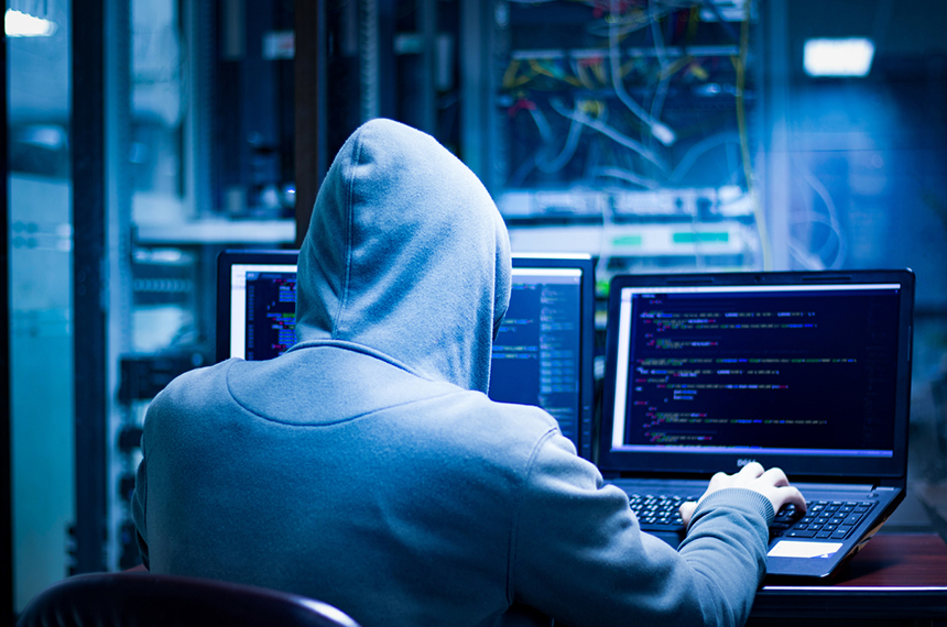 Hackers using laptop computers to penetrate security systems to steal big data from the server room